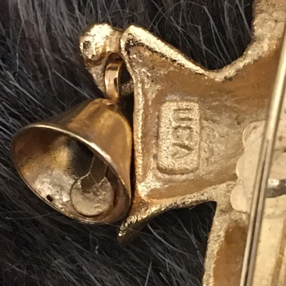 Vintage XOXO matte gold tone angel w/bell brooch